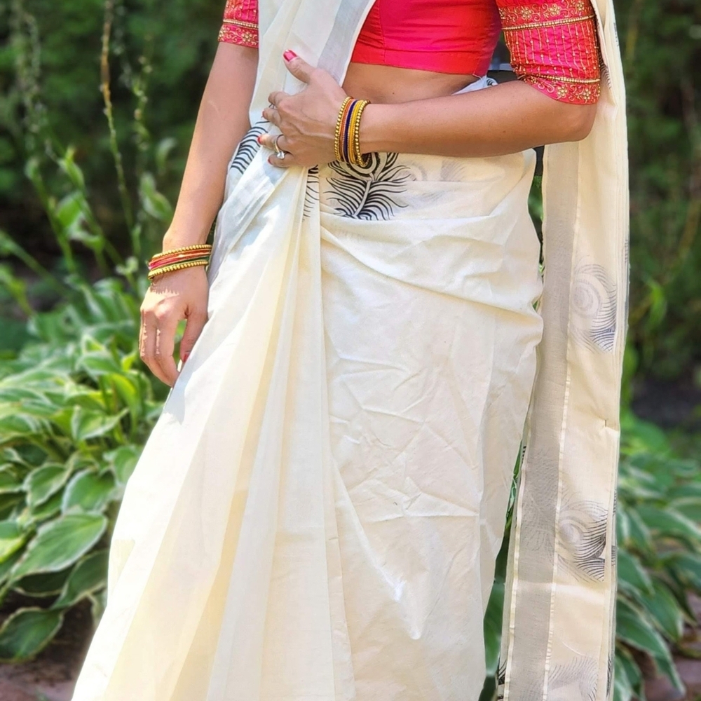 Elegant Cream and Red Saree